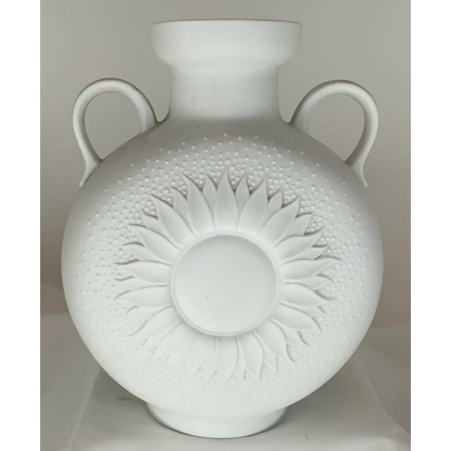 Pretty 1970s vintage double handled bisque porcelain vase with bas relief sunflower motif by A.K.Kaiser. Great condition