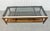 This listing is for a Mid-Century Modern Smoked Glass Coffee Table. Featuring a straight line design, rectangular smoked...
