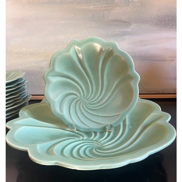 Vintage set of Art Deco celadon green ceramic tableware with a distinct swirled or spiral relief pattern, designed by...