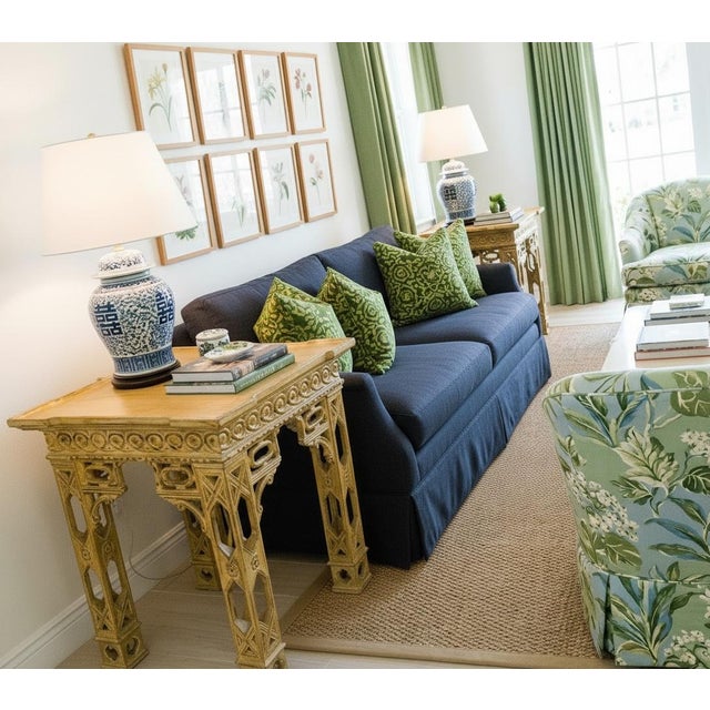 Description A striking pair of vintage chinoiserie accent tables with faux bamboo styling, pierced geometric legs, and...