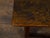 An English oak side table from circa 1800 with planked top, slender straight legs and side stretchers. This English oak...