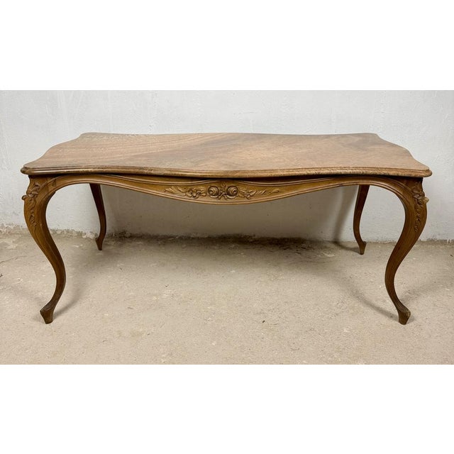 Elegant French Louis XV style coffee table crafted in solid wood, featuring a shaped marble top, graceful cabriole legs,...