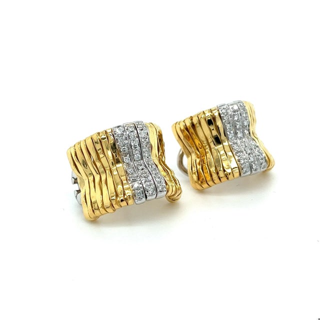 Orlando Orlandini signed handmade 18K yellow gold ribbed bar style hug hoops with 3 rows of white gold pave set round cut...