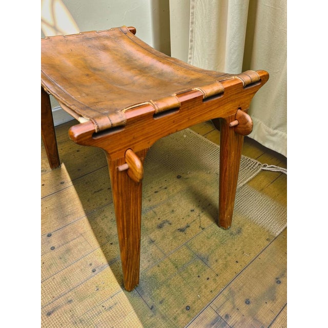 A unique, original stool/ottoman crafted by m. Hayat & bros. Ltd. Of peshawar, pakistan, a renowned manufacturer of high-...