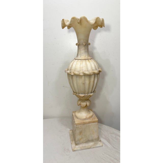 Add a touch of excellence to your space with this huge antique hand-carved alabaster stone sculptural vase. Crafted with...