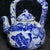 This is a beautiful vintage Chinese blue and white porcelain teapot, designed in the traditional "Tiliang" (overhead...