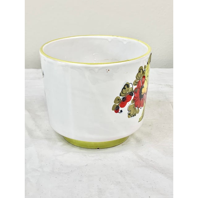 Beautiful vintage Cachepot. Made in Italy. Features a colorful floral design. Perfect for display or to use with a plant....