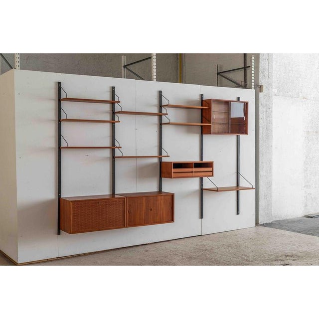 4-Bay teak wall unit, designed and produced by Poul Cadovius in Denmark, during the 1960’s. The system consists of five...