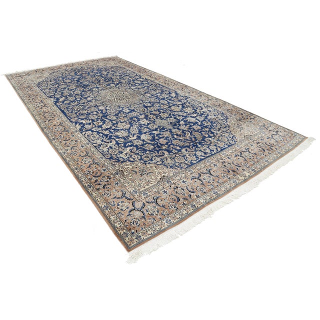 Beautiful hand-knotted Nain rug made from wool and silk. Nain is a small village located in central Persia that has...