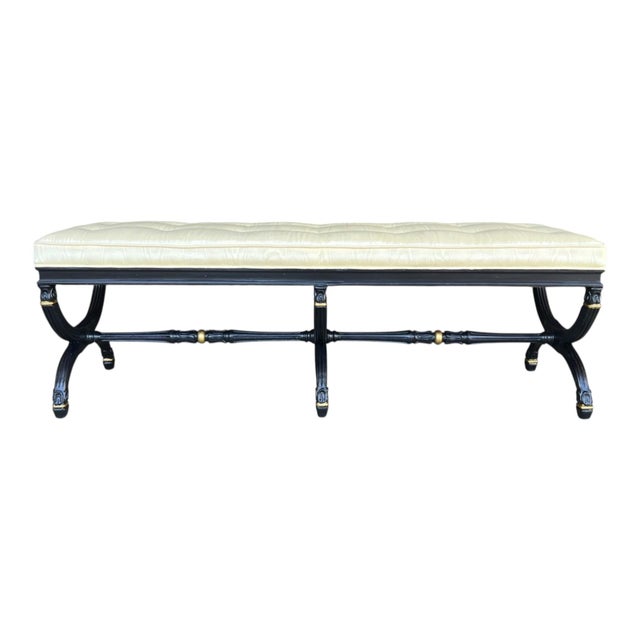 This elegant upholstered bench combines timeless classical design with a striking modern contrast. The generously tufted...