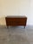 Beautiful Mid Century Modern Danish sideboard crafted in richly grained rosewood, showcasing deep tones and dramatic...