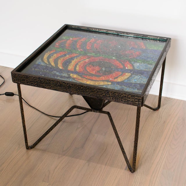 Make a striking statement with this rare and exquisite French coffee or side table, a true masterpiece of mid-century...