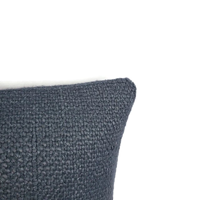 From Designers Guild is Aunelle in the color Indigo pillow cover. This pillow has a durable soft texture in a beautiful...