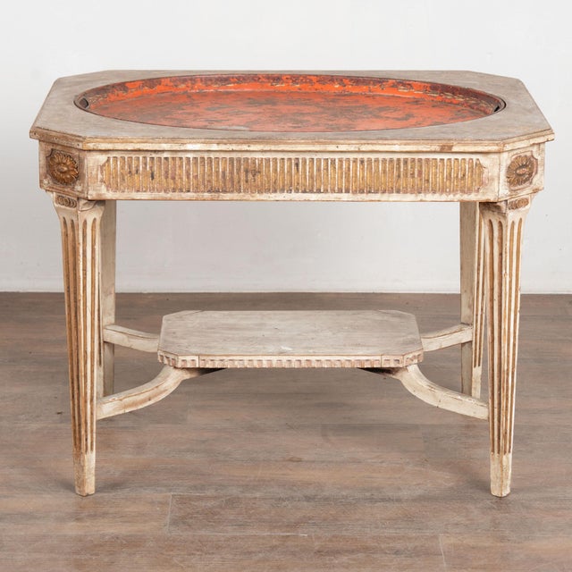 Late 19th century Gustavian style tray top side table crafted in oak. The table retains its original gray paint with white...