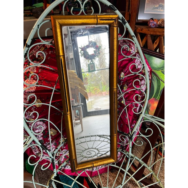 Up for consideration is a beautiful vintage gold faux bamboo skinny wall mirror. This would look lovely in your home, and...