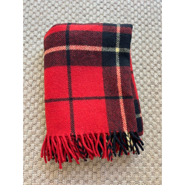 Vintage classic tartan plaid 100% wool throw blanket in red, black, and yellow. Marked "Troy Robe" of New Hampshire. A...