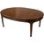 Vintage oval dining table featuring a warm medium brown finish and a beautifully figured burl wood veneer top. The elegant...