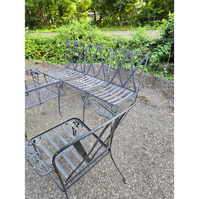 Vintage Wrought Iron Patio Set by Russell Woodard. This set features 8 pieces. It includes a 3 seat modular sofa,...