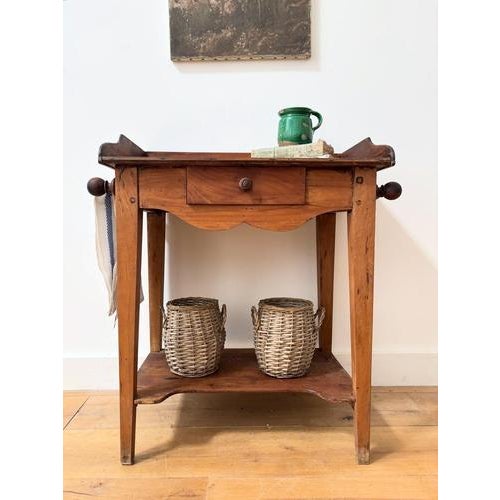 An early 20th century beech wood washstand with double towel rails. Warm and rustic English design. Dimensions : Height -...