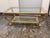 Design Plus Gallery presents a Neoclassical Italian Coffee Table from Provasi. This table showcases a gilded wooden frame...