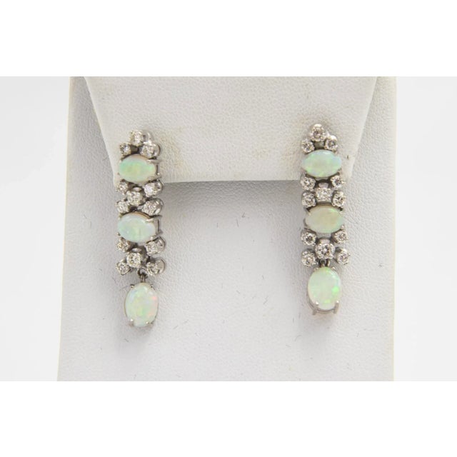 This is part of Chairish’s Fine Jewelry assortment. Custom made in the 1970s for an opal collector to highlight her...