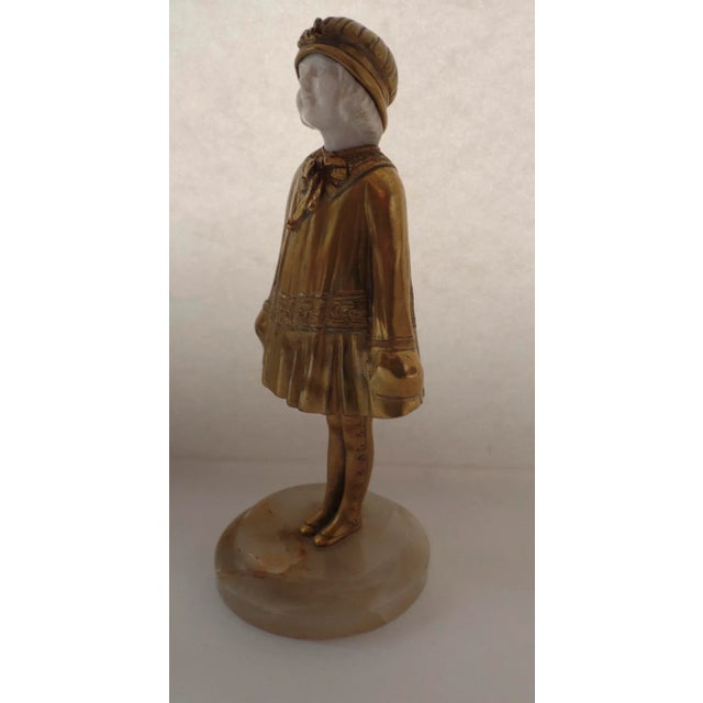 School girl by Demetre Chiparus. Measures 8" tall. Signed on back of dress. Demétre Haralamb Chiparus (16 September...
