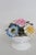 This gorgeous Floral Figurine is made of fine bone china. This darling collectible is marked on the bottom with the...
