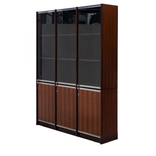 A display bookcase produced by anonima castelli in the 1980s, featuring a rigorous design and an elegant interplay of...
