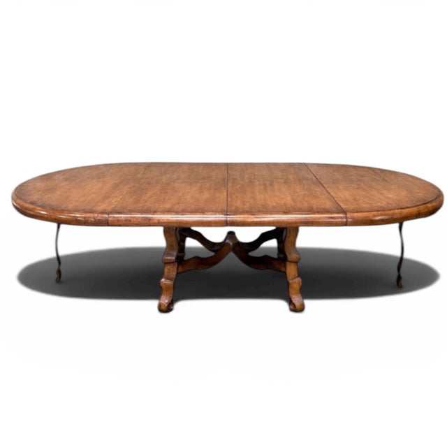 Simply stunning, an extra-large custom table made by Quatrain, a Dessin Fournir company. Handcarved from walnut in a...