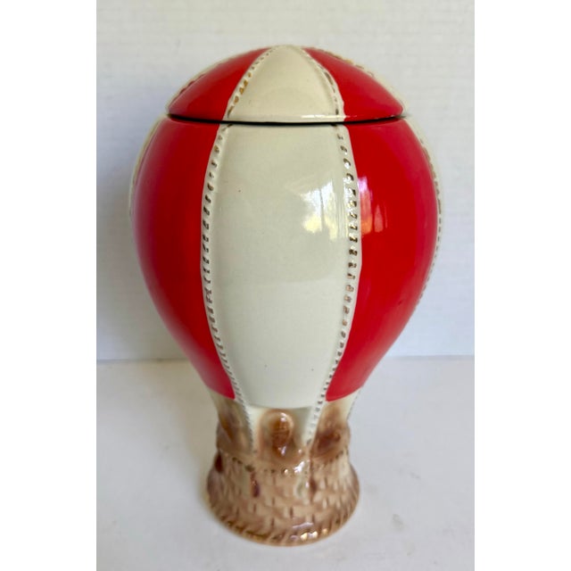 Here is a whimsical ceramic hot air balloon liquor decanter designed by Paul Lux in 1969. Finished in bold red and white...