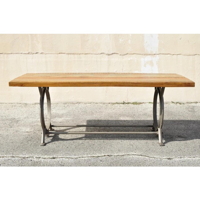Contemporary Industrial Style Cast Iron and Reclaimed Wood Farmhouse Rustic Dining Table. Item features a heavy cast iron...