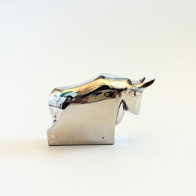 A vintage silver plated abstract figurine of a bull. Designed by Gunner Cyren for Dansk in the 1970s. Nice heavy weight...