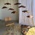 Medium-sized, flat, undulating leaf pendant light in flower-grain teak, smooth underneath. Elegant and decorative design,...