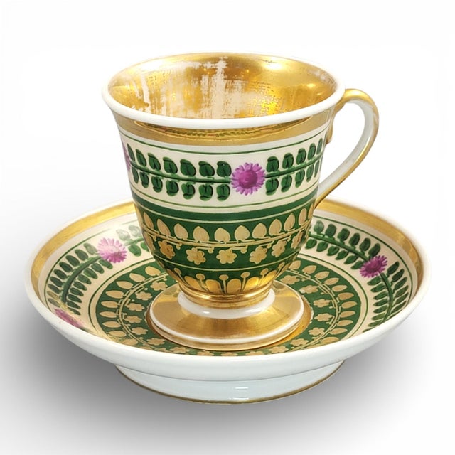 An Empire-period porcelain cup and saucer from the Giesshübel (Kysibl) factory, produced in Bohemia in the early 19th...