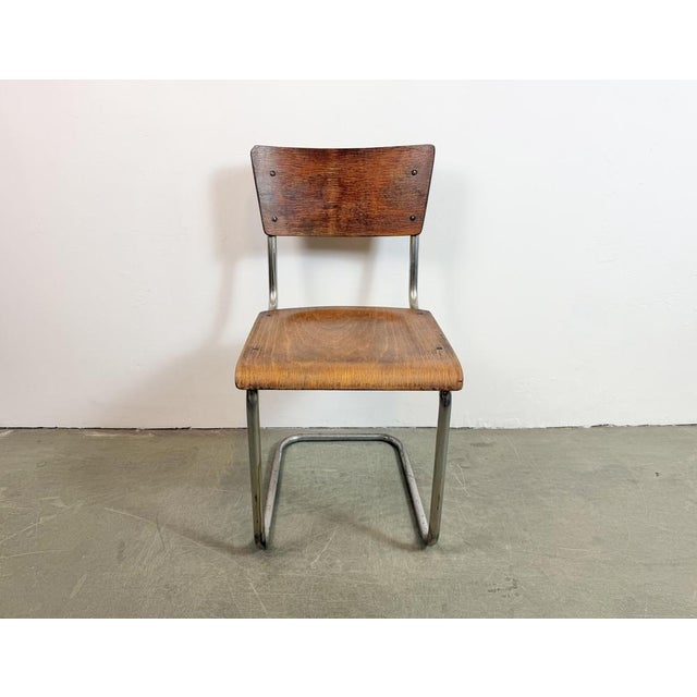 Vintage industrial chair made in former Czechoslovakia during the 1960s. The construction is made of chrome plated iron...