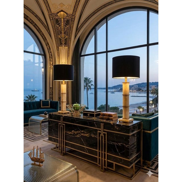 Offering a vintage pair of Italian Rialto Marble Art Deco style table lamps, circa Late 20th Century. These extremely...