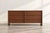 An exceptional T.H. Robsjohn-Gibbings Thin-Line dresser from the 1950s, showcasing the designer’s refined approach to...