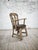 A strong yet calm character piece, combining sculptural wooden construction with understated natural elegance. The solid...