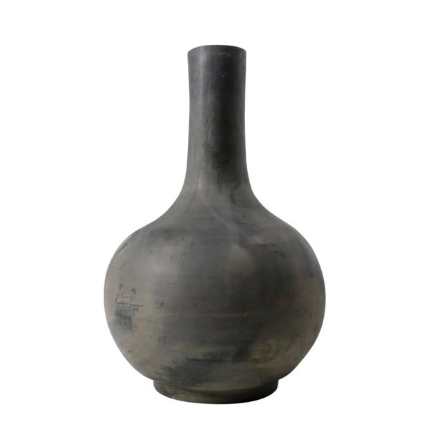 Vintage style black / dark gray earth pottery. Wonderful for many uses and display on its own or in a group. Will look...