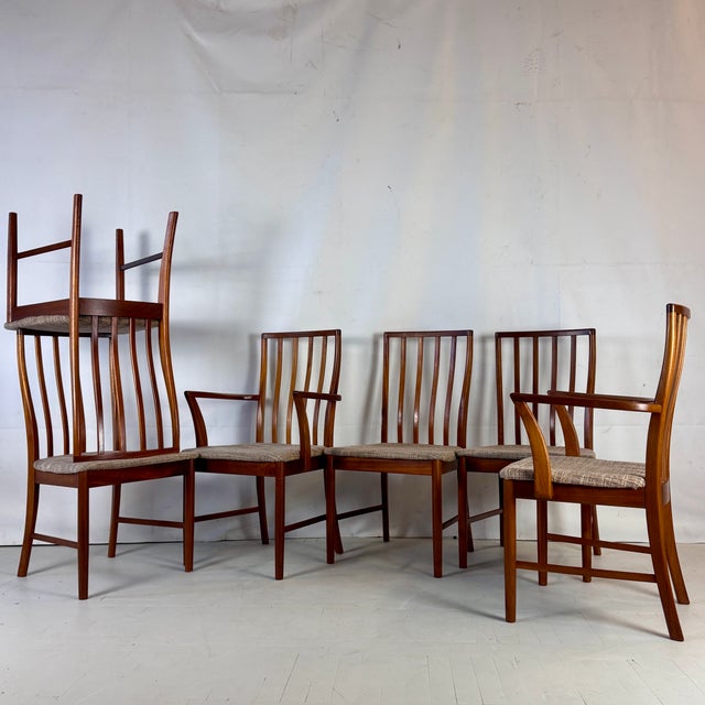 Set of six mid-century dining chairs by mcintosh, crafted in britain during the 1960s. Featuring elegant lines, sturdy...