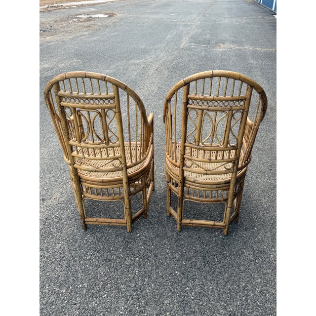 Taller than the average example, burnished patina throughout. Cane seats without tears. Classic chinoiserie design...