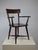 Elegant modernist wooden armchair dating from the 1940s. The chair features a beautifully balanced construction and a...