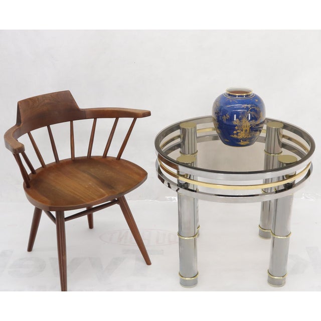 Mid-Century Modern round chrome and smoked glass side end table stand.
