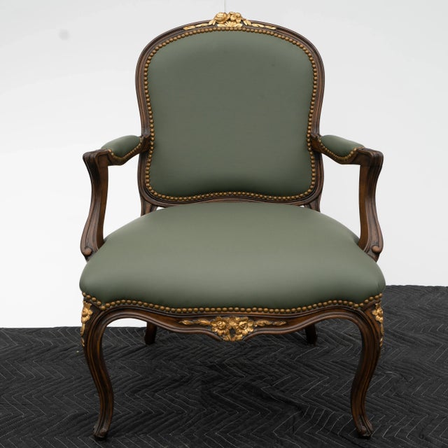 Pair of Custom built leather armchairs in Louis XVI Beregere style. Green leather fabric. Hand carved, gold painted...
