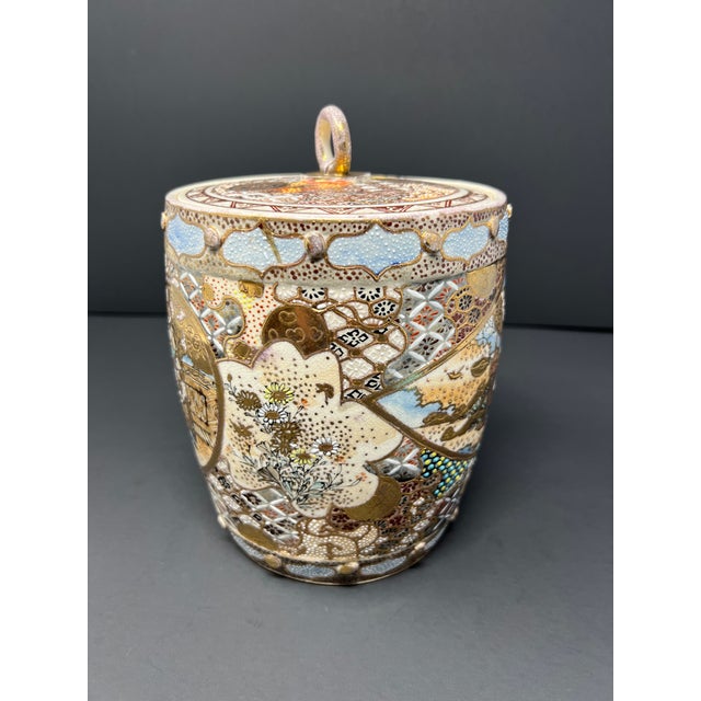 Antique Japanese Satsuma Biscuit Jar with Lid, circa 1900 Finely decorated antique Japanese Satsuma biscuit jar featuring...