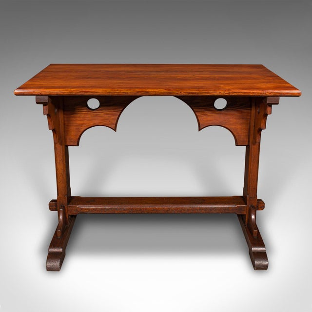 This is a superb Victorian period hall table, showcasing Gothic Revival influences in solid pitch pine, circa 1870. This...