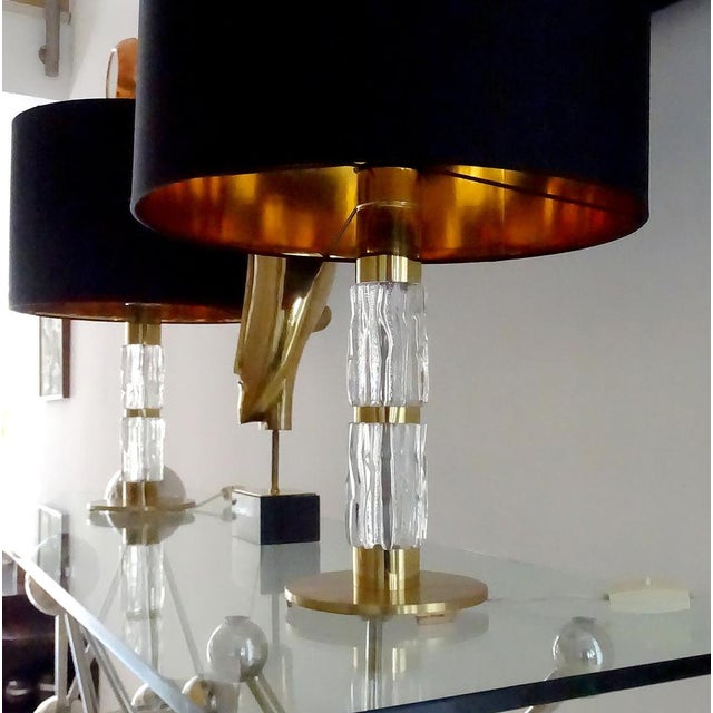 Pair of very large table lamps by Kaiser circa 1965-1970, featuring a structured glass column with polished and patinated...