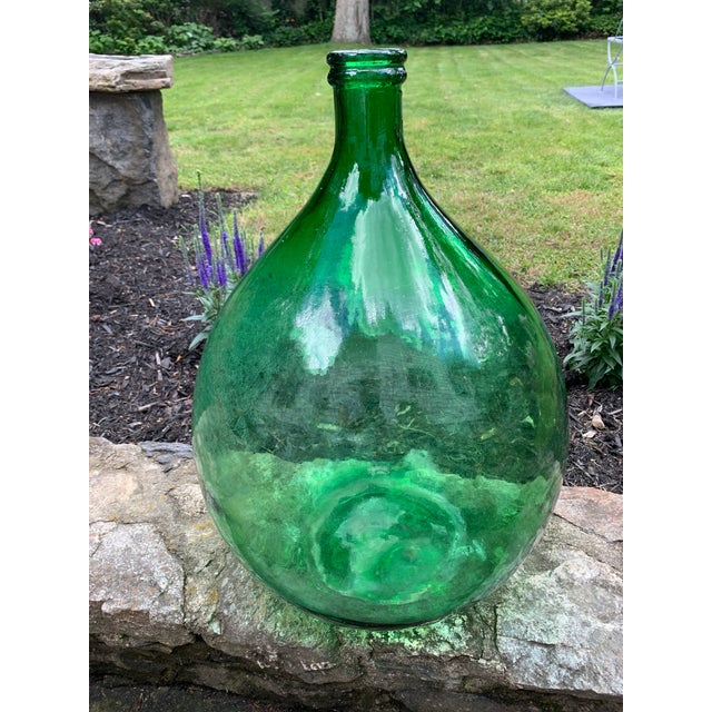 French demijohn with antique wavy glass used to ferment wine. Makes a stunning lamp or floor decor!