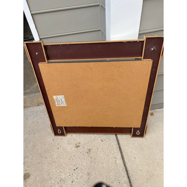 Striking and sophisticated, these vintage Art Deco-style mirrors features a bold geometric frame layered with alternating...