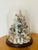 Beautiful detailed artisan made Christmas tree with angels under glass dome.